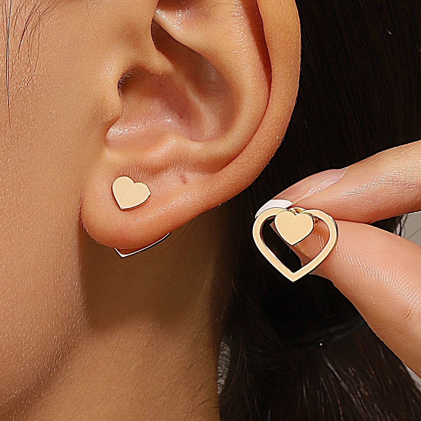 Triangle stud earrings for women.