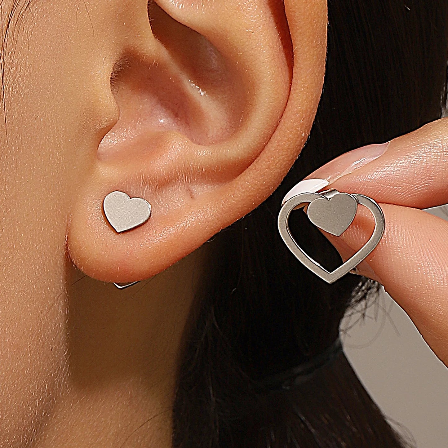 Triangle stud earrings for women.