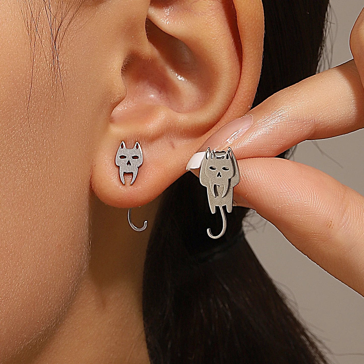 Triangle stud earrings for women.