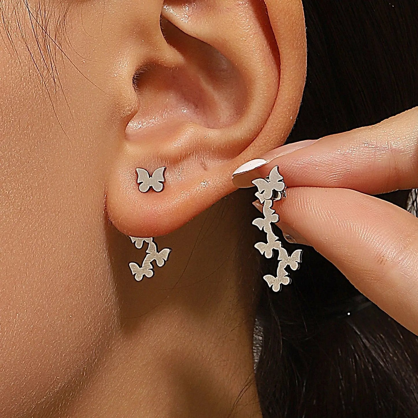Triangle stud earrings for women.