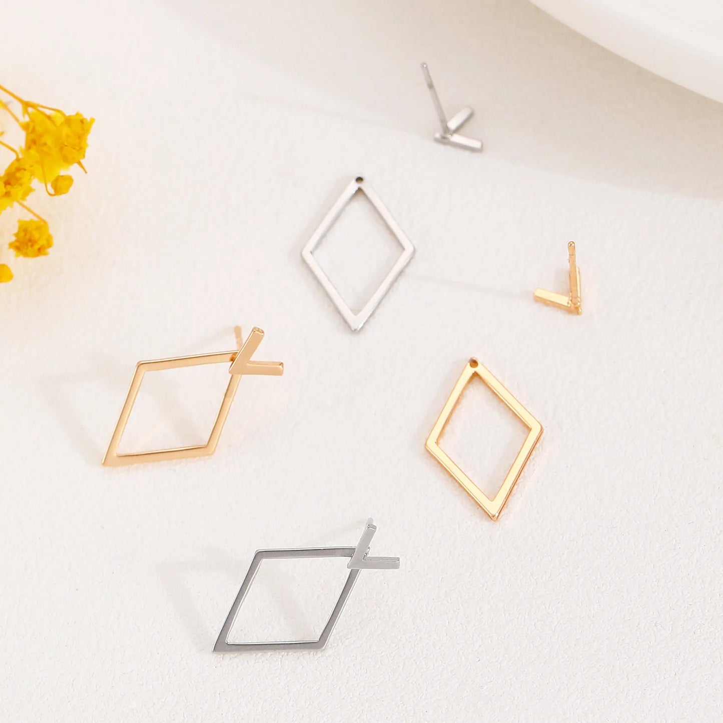 Triangle stud earrings for women.