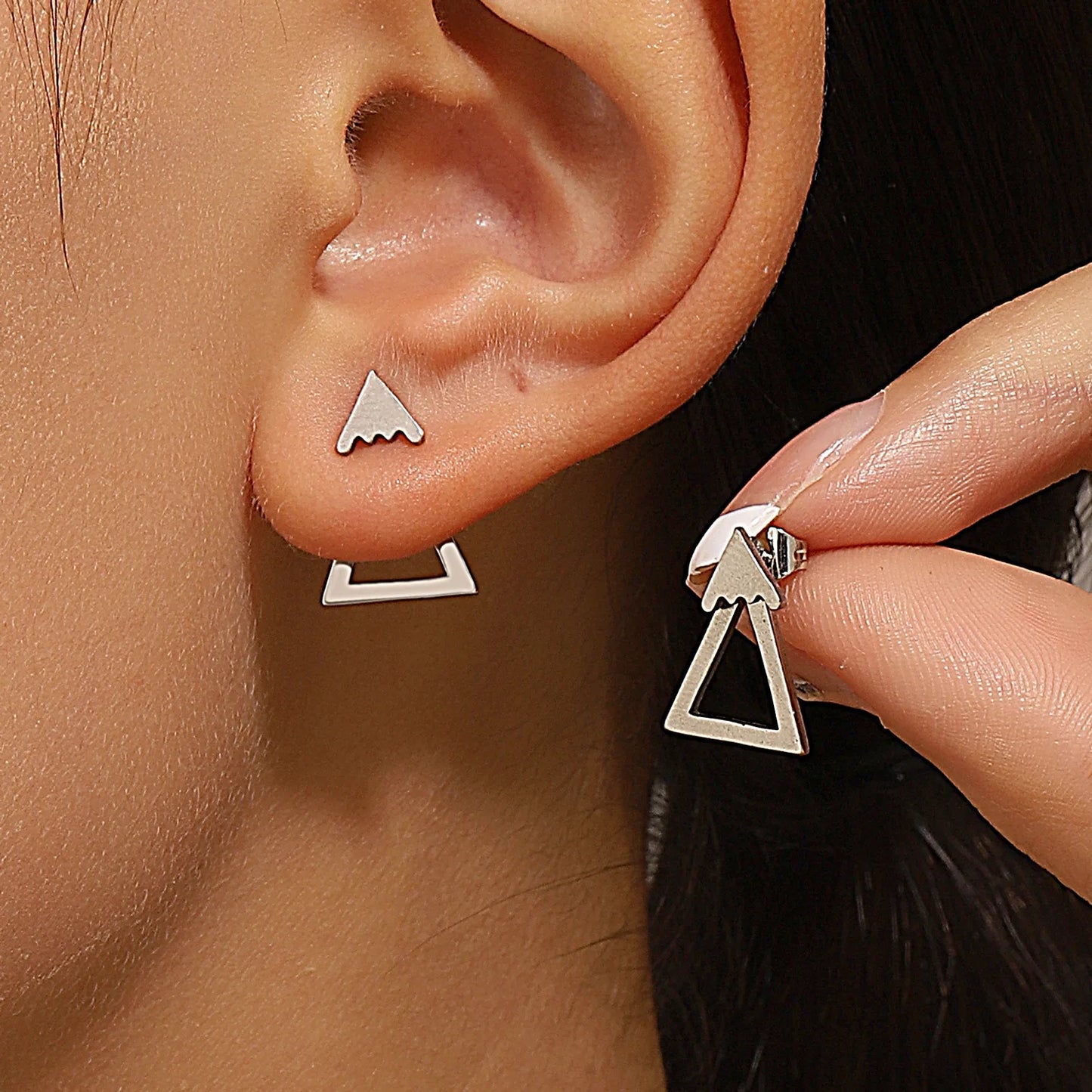 Triangle stud earrings for women.
