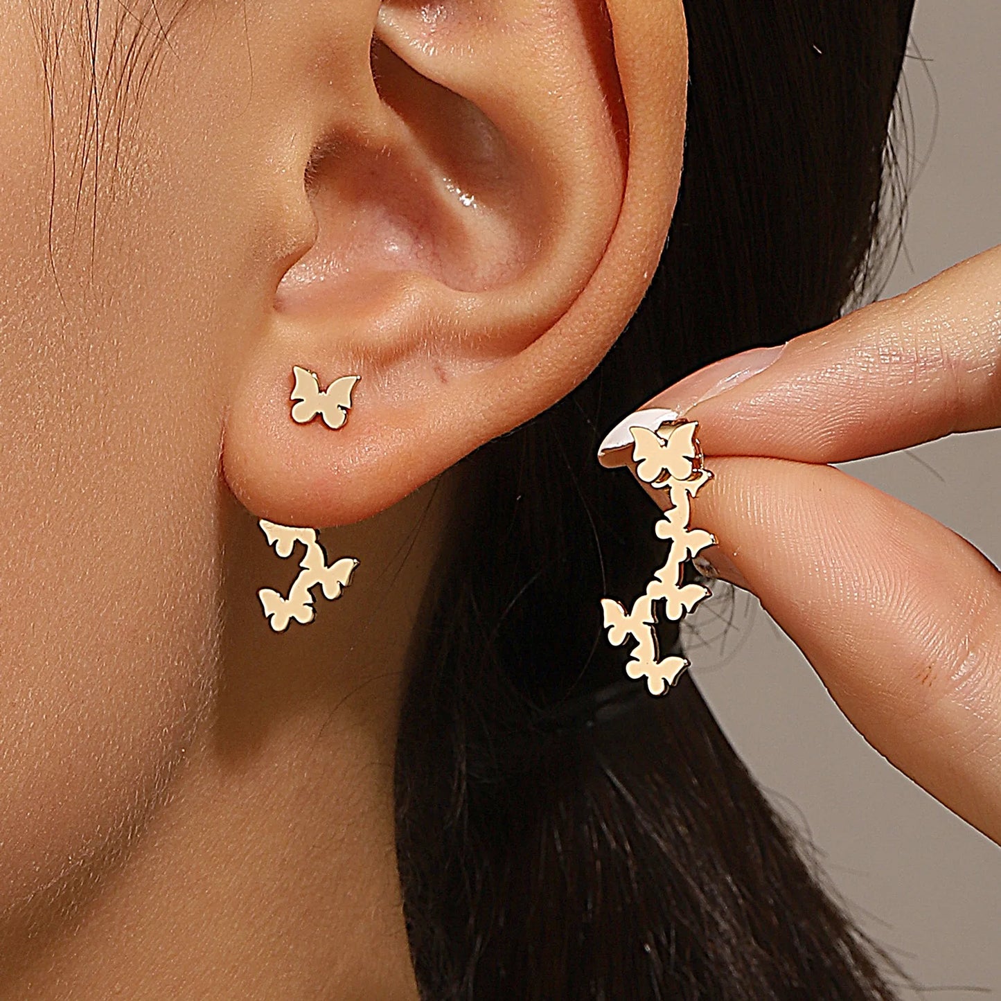 Triangle stud earrings for women.