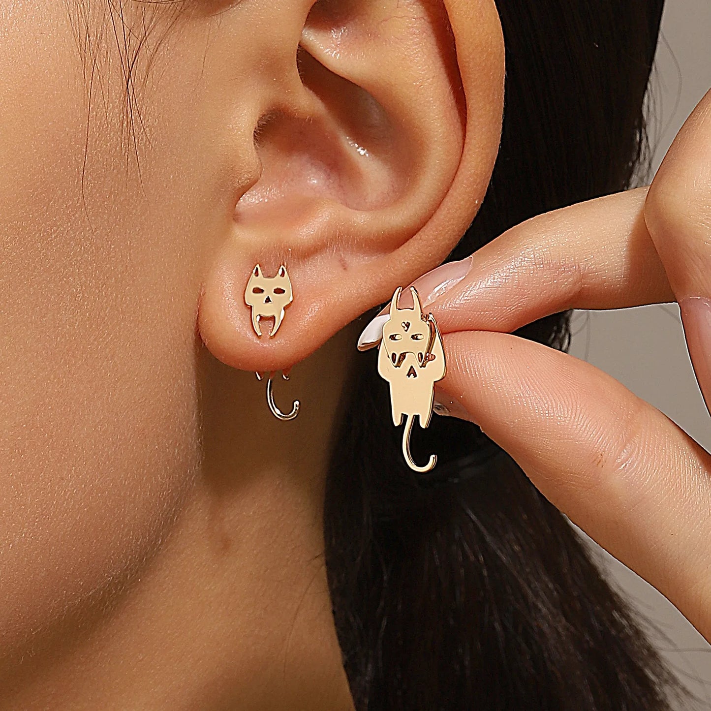 Triangle stud earrings for women.