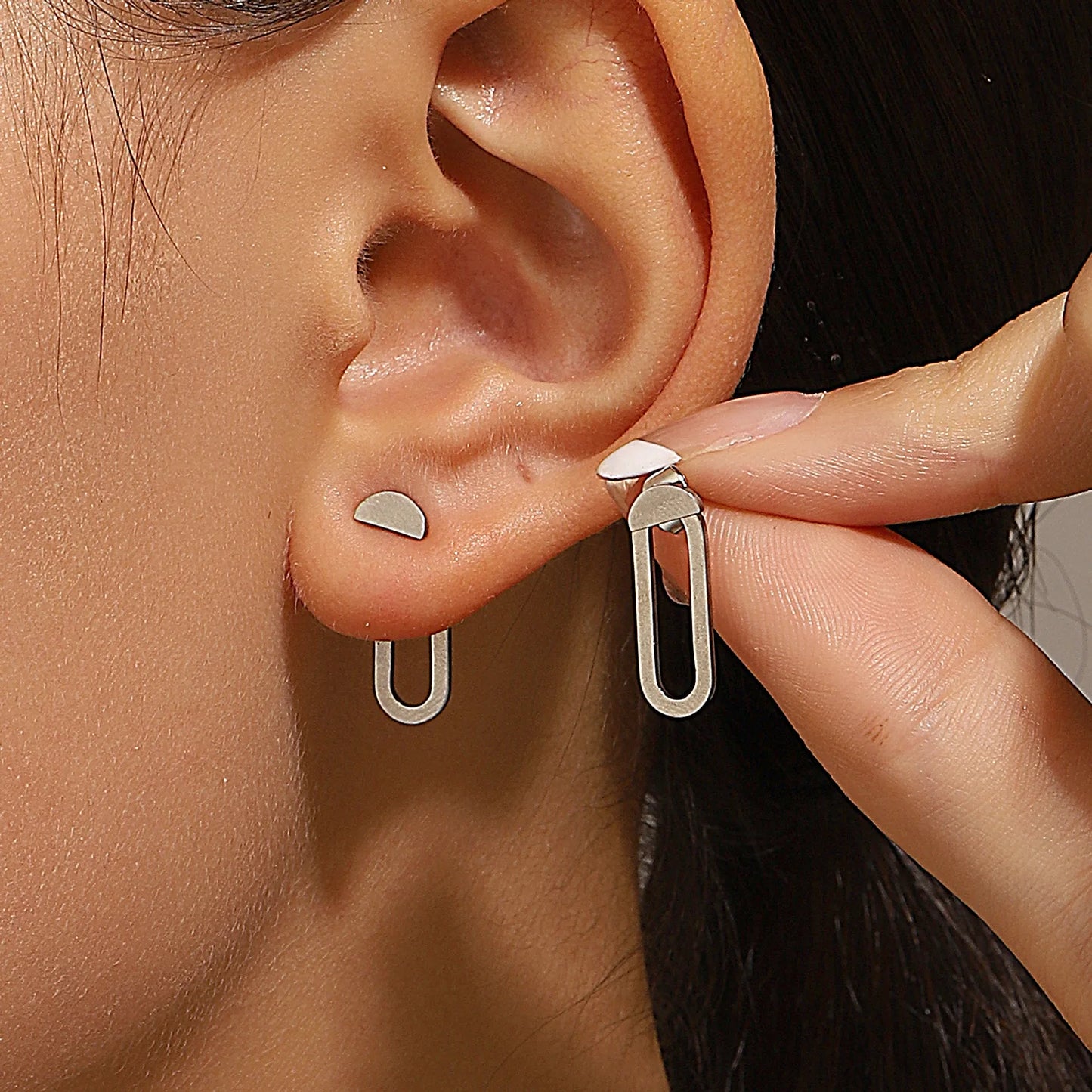 Triangle stud earrings for women.