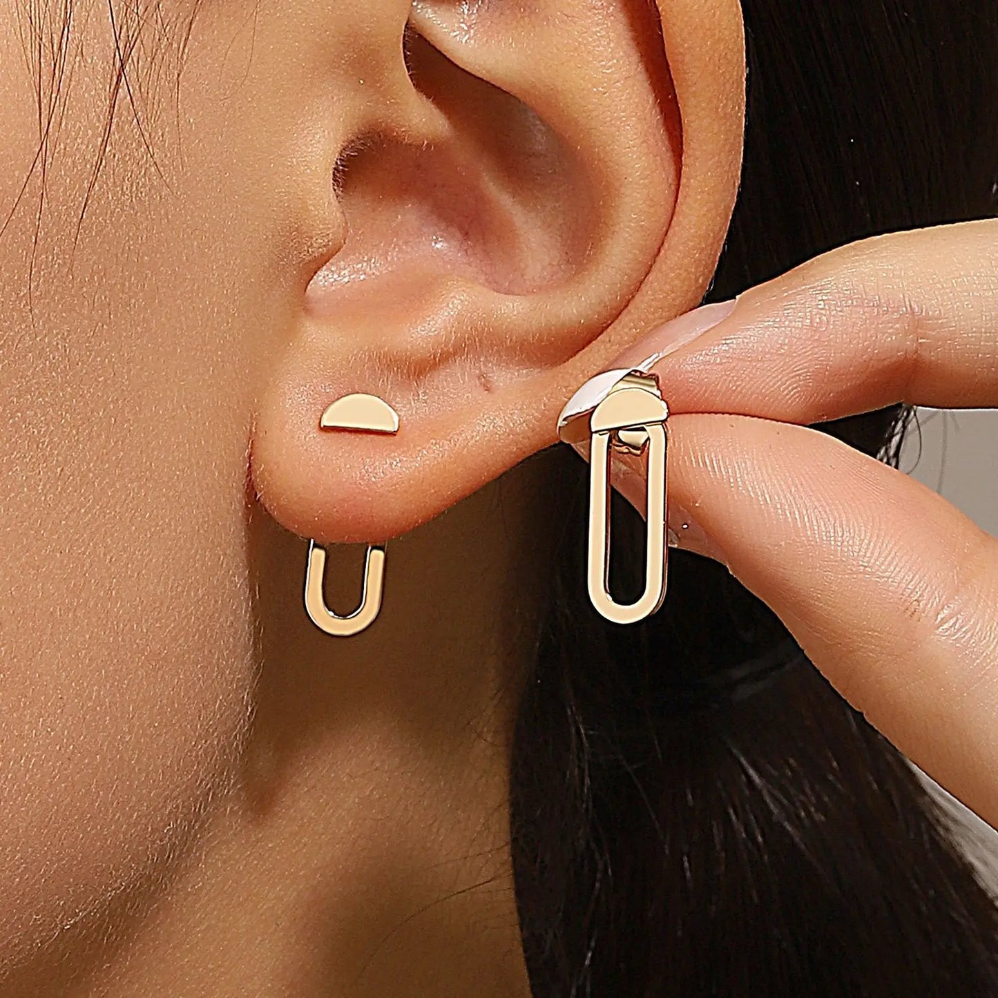 Triangle stud earrings for women.