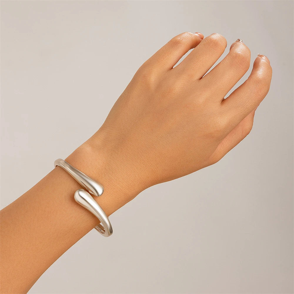Wide metal bracelet ring for women gold and silver.