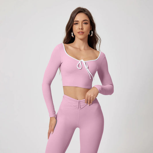 High-waisted, quick-drying yoga suit with long sleeves and round neck.