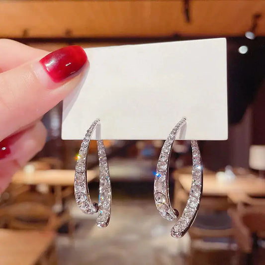 Diamond earrings.